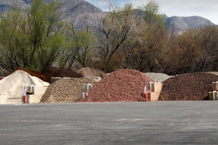 Piles of Rock and Mulch in the Parking Lot at Sandee's Soil & Rock in Ogden, UT.